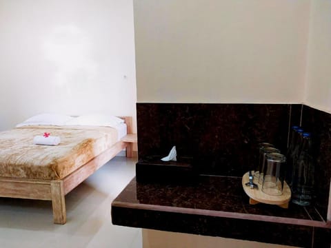 Lidah Lokal Singaraja Triple Bedroom with Balcony Vacation rental in Buleleng