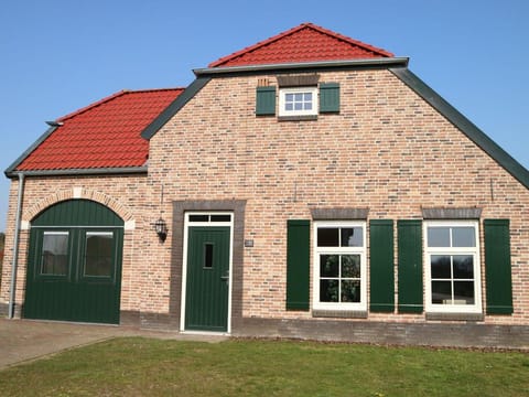 Farmhouse in Limburg with Sauna  Hot Tub Villa in Roggel