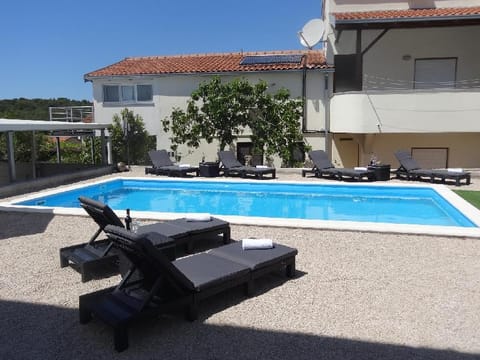 Modern island apartment with pool 80 meters from the sea B Apartment in Šibenik-Knin County, Croatia