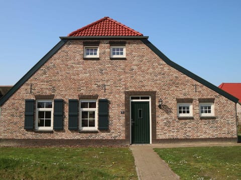 Farmhouse in Limburg near Subtropical Pool Villa in Roggel