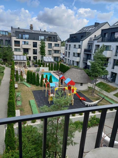 DVIEJŲ KAMBARIŲ BUTAS SU VAIZDU Į BASEINĄ IR SODĄ. Apartment in Palanga