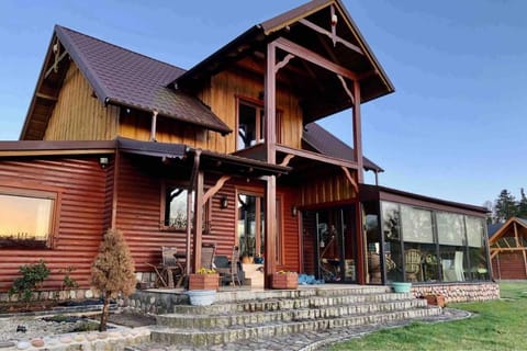 Dom nad jeziorem z prywatnym kortem, jacuzzi,sauna Vacation rental in Pomeranian Voivodeship