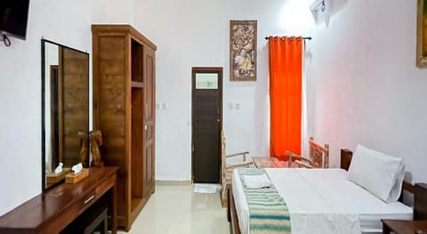 Men Bebas Homestay near Ubud Mitra RedDoorz Bed and Breakfast in Abiansemal