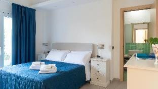 Welcomely - Porto Corallo Seafront Apartment in Cala Liberotto