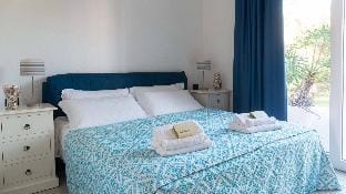 Welcomely - Porto Corallo Seafront Apartment in Cala Liberotto