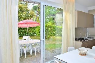 Apartment with private garden next to the beach - By Beahost Rentals Apartment in Friuli-Venezia Giulia