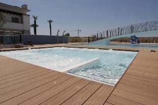 Recently built row house with huge swimming pool - By Beahost Rentals Apartment in Bibione