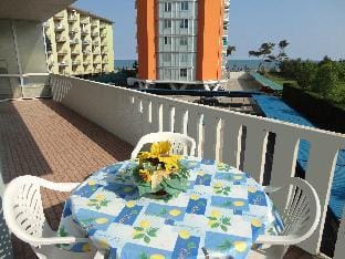 Cozy three-room apartment with large terrace A  C - 7 people Apartment in Porto Santa Margherita