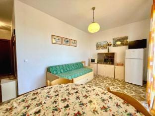 Cozy three-room apartment with large terrace A  C - 7 people Apartment in Porto Santa Margherita