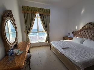 Golden Hour Beach View Holiday Home Apartment in Ajman