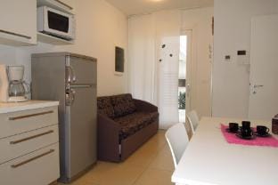 Nice Apartment with huge swimming pool and solarium By Beahost Rentals Apartment in Bibione