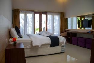 Stunning Deluxe Double Room with Pool View Vacation rental in Buleleng
