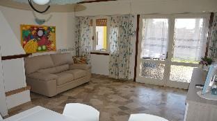 Cozy and relaxing villa with private garden by Beahost Rentals Villa in Caorle