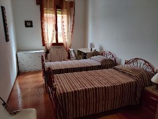 Colorful and bright 3-bedroom apartment by Beahost Rentals Apartment in Caorle