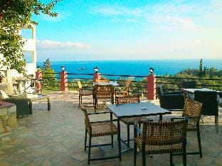 Studio Apartments with large swimming pool and Sea view at Pelekas Beach, Corfu Apartment in Corfu, Greece