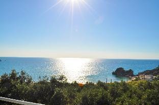 Studio Apartments with large swimming pool and Sea view at Pelekas Beach, Corfu Apartment in Corfu, Greece