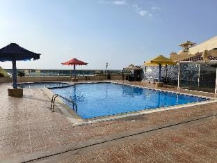 Smart Home Vacation Home701 Apartment in Al Sharjah