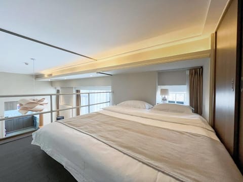 【东桉美宿|愉景惬意】邻北京环球影城|Loft一居室套房|双大床住4人|家庭出游|地铁1号线直达故宫 Apartment in Beijing