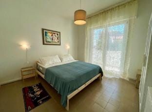 Refreshing villa with private garden near the beach Apartment in Porto Santa Margherita