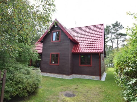 Holiday home with fireplace and private garden Vacation rental in Pomeranian Voivodeship