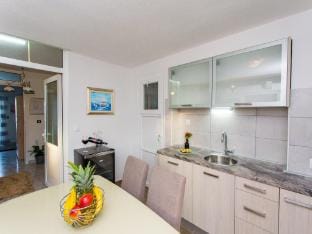 Apartments Tino- Two Bedroom Apartment with Balcony and Sea ViewA1 Apartment in Split-Dalmatia County