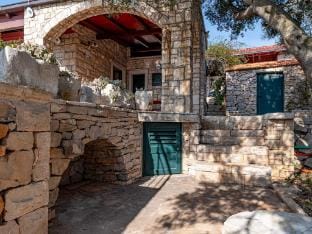 Stone House San Pelegrin-Two Bedroom Holiday Home with Terrace and Sea View Vacation rental in Dubrovnik-Neretva County