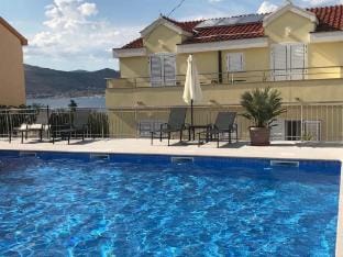 Apartments Villa Moonlight - One Bedroom Apartment with Sea View Balcony and Terrace Sandra Apartment in Okrug Gornji