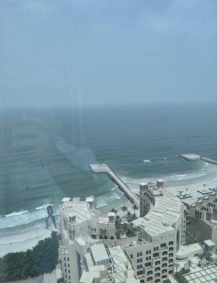 Single cozy bedroom with sea view window Apartment in Ajman