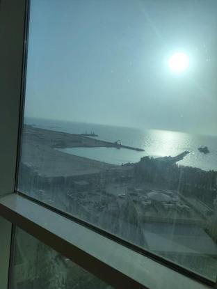 Single cozy bedroom with sea view window Apartment in Ajman