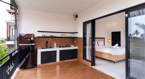 Room with kitchen Parafrutts Ubud Apartment in Abiansemal