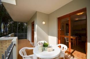 Modern two room aparment surrounded by trees in the city center Apartment in Bibione