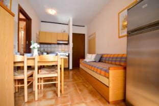 Modern two room aparment surrounded by trees in the city center Apartment in Bibione