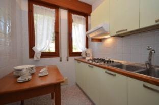 Enjoy your holiday in a four room apartment surrounded by trees Apartment in Bibione