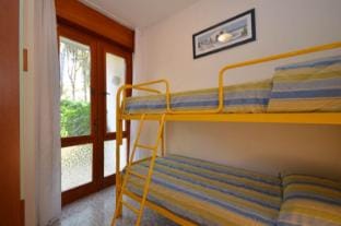 Enjoy your holiday in a four room apartment surrounded by trees Apartment in Bibione