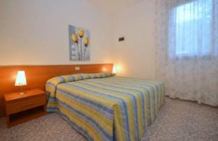 Enjoy your holiday in a four room apartment surrounded by trees Apartment in Bibione