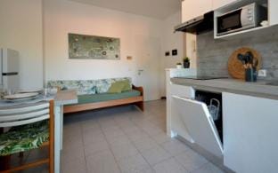 Spacious apartment with free Wifi and shared swimming pool in a quiet area Apartment in Lignano Sabbiadoro