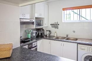 Tranquil 2BR w/ Balcony, Pool, Walk to Beach! Vacation rental in Cape Town