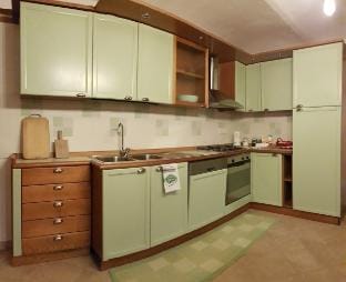 typical farmhouse with a wood-burning fireplace Apartment in Piedmont