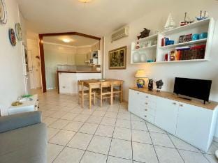 Bright apartment with pool Apartment in Porto Santa Margherita