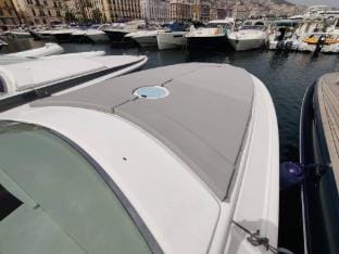 Fall in Love with the Amalfi Coast Charming Boat Rental in Naples Docked boat in Naples