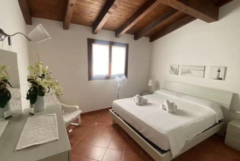 Delightful sea view apartment with veranda Apartment in Punta de su Torrione