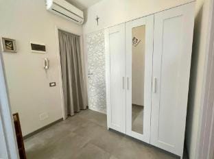 Bright apartment by the beach with a lovely balcony Apartment in Porto Santa Margherita