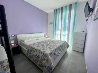 Bright apartment by the beach with a lovely balcony Apartment in Porto Santa Margherita