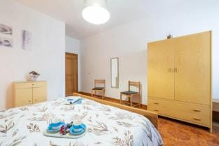 Large seaside apartment with patio in Lu Bagnu Apartment in Sardinia