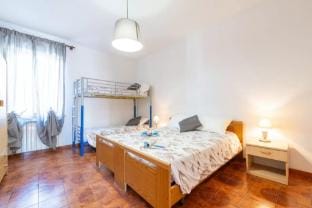 Large seaside apartment with patio in Lu Bagnu Apartment in Sardinia