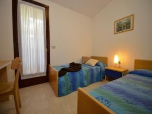 Modern Apartment Featuring a Private, Fenced Garden Apartment in Bibione