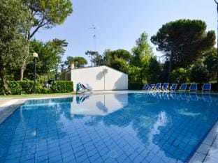 Modern Apartment Featuring a Private, Fenced Garden Apartment in Bibione