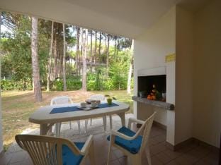 Modern Apartment Featuring a Private, Fenced Garden Apartment in Bibione