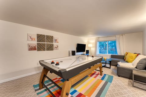 Game room fun with foosball and air hockey.