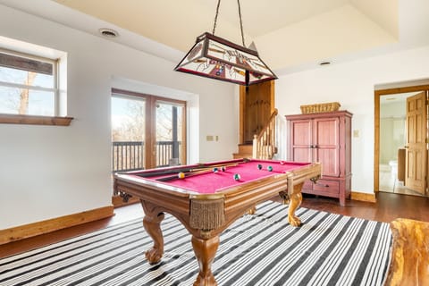 Game room with a pool table!